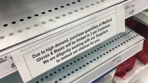 An empty store shelf displays a limit on rubbing alcohol during COVID-19 in Stock Footage 127851127