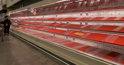 Empty store shelves in grocery store do to pandemic from coronavirus Stock Footage