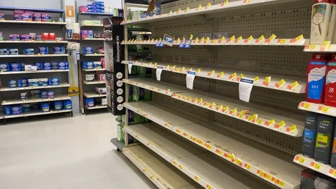 Empty store shelves at Houston area stores durning coronavirus pandemic. Stock Footage 126247401