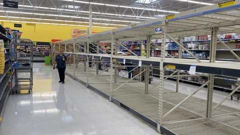 Empty store shelves at Houston area stores durning coronavirus pandemic. Stock Footage 126247770