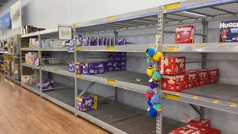 Empty store shelves at Houston area stores durning coronavirus pandemic. Stock Footage 126247787