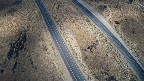 Empty stormy desert highway  Stock Footage 88588707