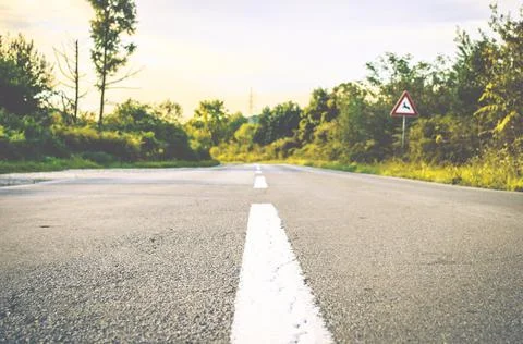 Empty Straight Road in the Middle of the Forest in Croatian Countryside Stock Photos