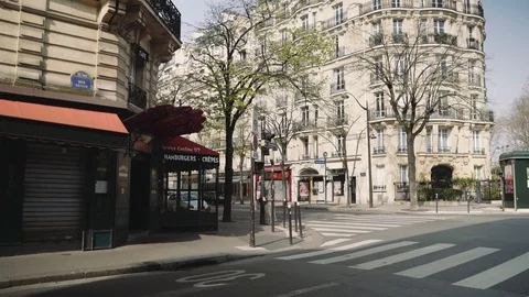 Empty street and closed cafe terrace in Paris during coronavirus lockdown 4K Stock Footage 126752942