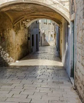 Empty street with arch Stock Photos