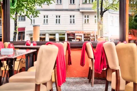Empty street cafe with mirror window in Berlin Stock Photos