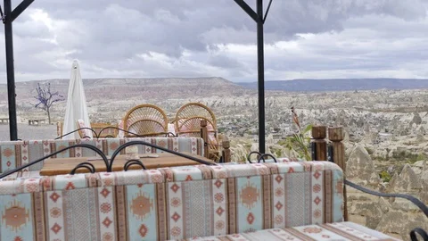 Empty street cafe overlooking the rocky valley of Cappadocia Stock-Footage 100924386