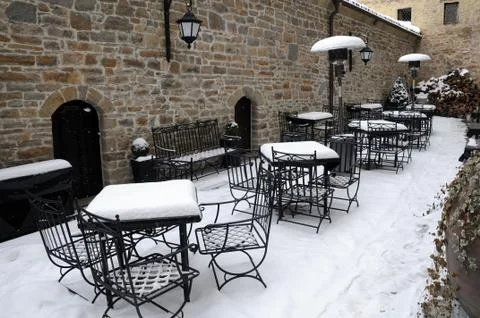 Empty street cafe in the winter Stock Photos