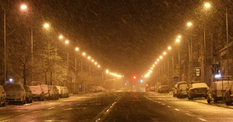 Empty street due to a ban on movement - COVID 19 - snowy night Stockbeeldmateriaal 127259045