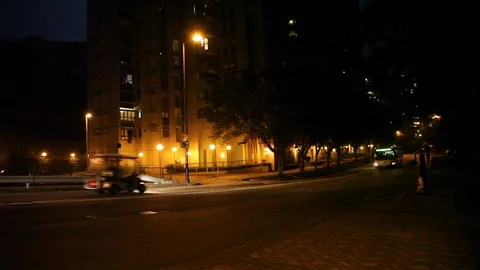 Empty street in the night only bus running Stock Footage 114137417