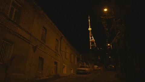 Empty street night tower old car vintage Tbilisi 库存影片 109071760