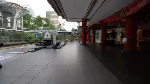 Empty street with one jogger during pandemic Stock Footage 156306370