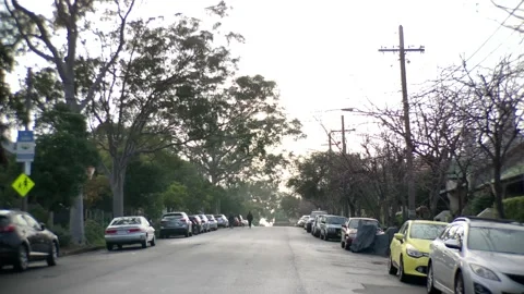 Empty street while walking into sunset Stock Footage 144375572