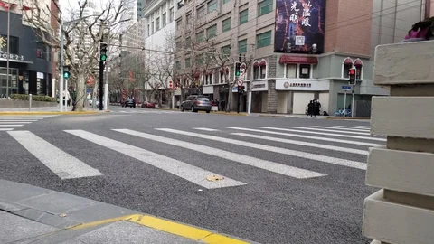 Empty Streets in China with only few Cars Driving By Stock Footage 124576226