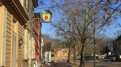Empty streets of Williamsburg entered by colonial re-enactor Stock Footage 10828117