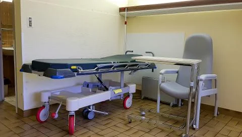 Empty stretcher trolley, special bed in hospital room Stock Photos