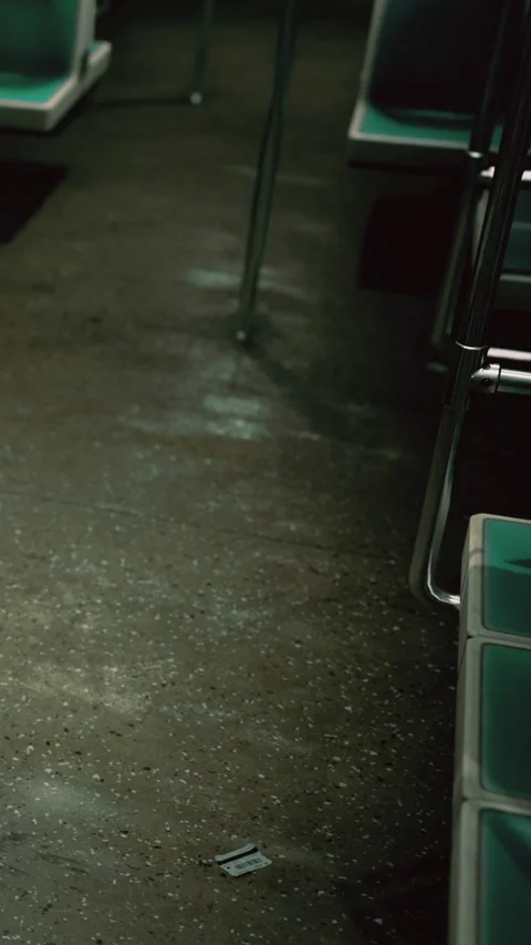 Empty subway car reveals reflections on wet floor during early morning hours Stock Footage 334241880