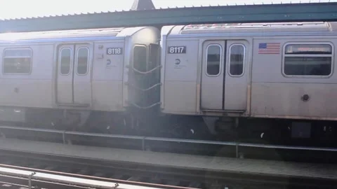 Empty subway passing through an uncrowded station Stock Footage 136205192