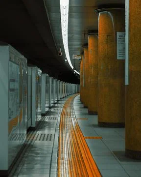 Empty Subway Platform with Yellow Path Stock Photos