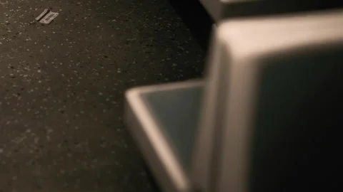 Empty subway seat with a lost item on the floor in the evening commute Stock Footage 339493591
