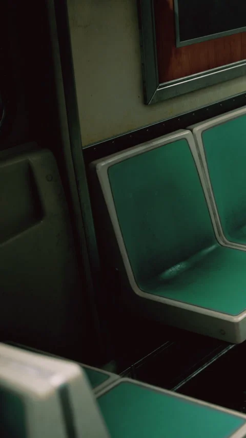 Empty subway seats in a city train during early morning hours Stock Footage 334261997