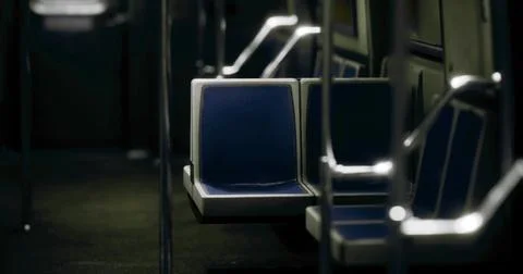 Empty subway train interior with blue seats in quiet moment Stock Illustration