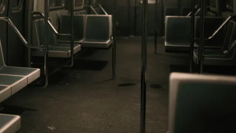 Empty subway train interior during evening commute in a city Stock Footage 342039295