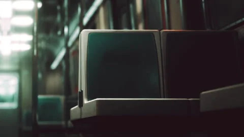 Empty subway train interior with seats and dim lighting Stock Footage 342802922