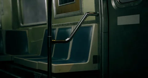 Empty subway train interior showcasing desolate seating and handles Vidéo 319062240