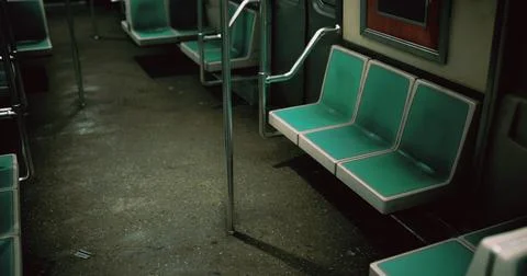 Empty subway train interior in urban setting during late night hours Stock Illustration