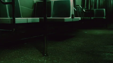 Empty subway train at night with green lighting in the interior Stock Footage 343575637