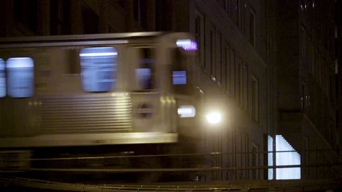 Empty Subway Train Passing Overhead at Night Stock Footage 127344442