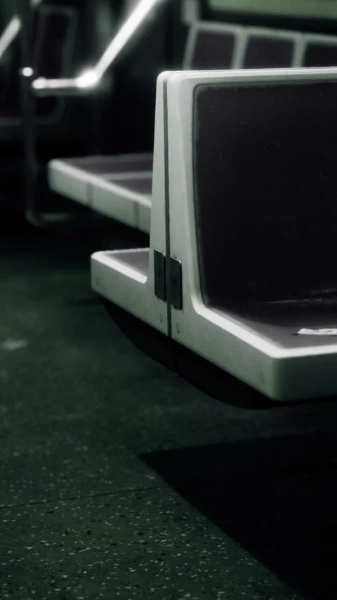 Empty subway train seats in a city during the evening hours Vídeos de archivo 346755092