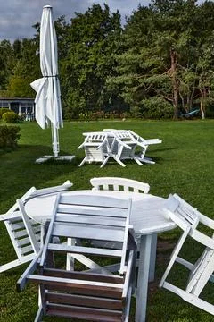 An empty summer cafe in nature. End of the holiday season Stock Photos