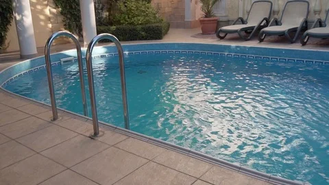 Empty sun loungers around pool. Stock Footage 119219333