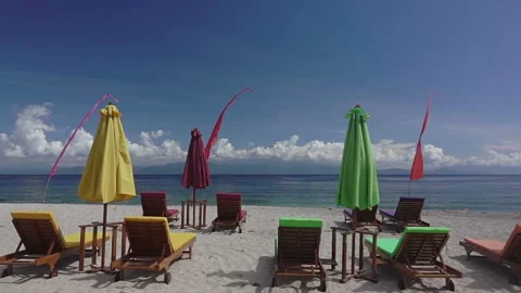 Empty Sunbeds and Umbrellas on the Beach. Slow Motion 스톡 동영상 106455512