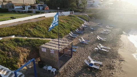 Empty sunbeds on beach in Greece Stock Footage 166037770