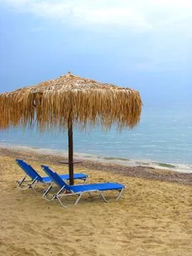 Empty sunbeds Stock Photos