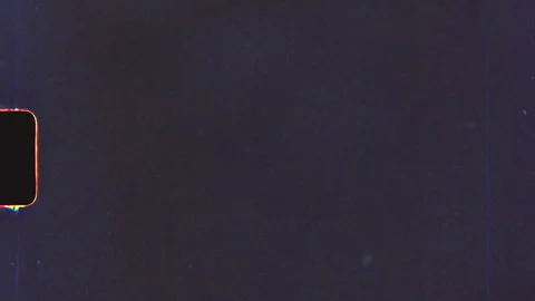 Empty super 8 film frames showing dust and scratches Stock Footage 312993624
