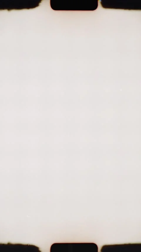 Empty super 8 film frames transitioning smoothly Stock Footage 314985230