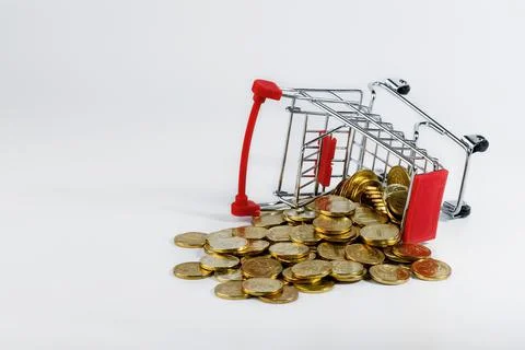 An empty supermarket cart with red inserts on a white background with scatter Stock Photos