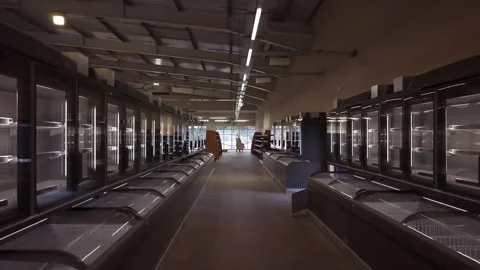 Empty supermarket freezer aisle under renovation, moving smooth Stock Footage 343783220