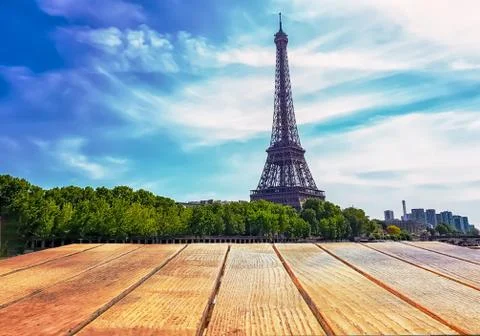 Empty surface of a wooden table on a background of Paris France Stock Photos