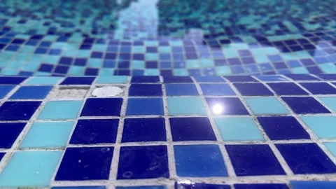 Empty swimming pool with calm water daylight reflection and clear water.  Stock Footage 160405095