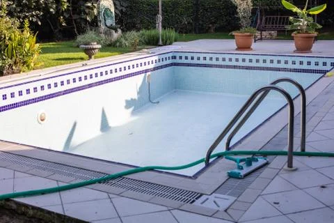 Empty swimming pool  end of the summer season Stock Photos