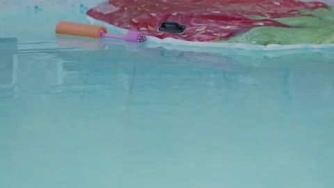 Empty Swimming Pool with Float and Toys Stock Footage 134856792