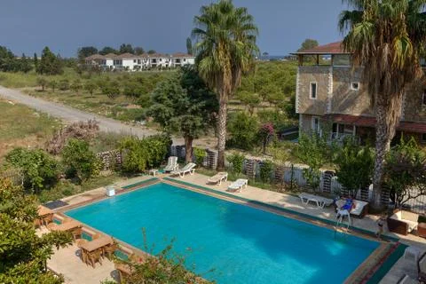 Empty swimming pool for guests of a small hotel, a top view Stock Photos