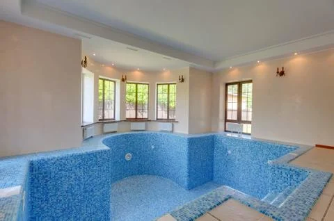 Empty swimming pool in house. first floor in cottage. 写真素材