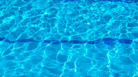 Empty swimming pool side in sunny resort... | Stock Video | Pond5