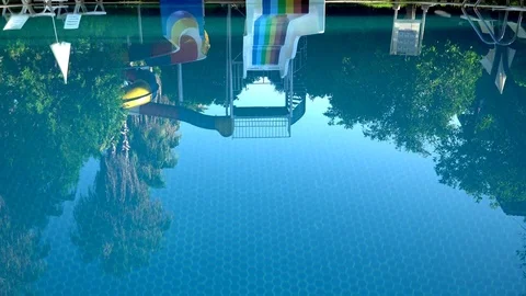 Empty swimming pool with slides Stock Footage 78492030